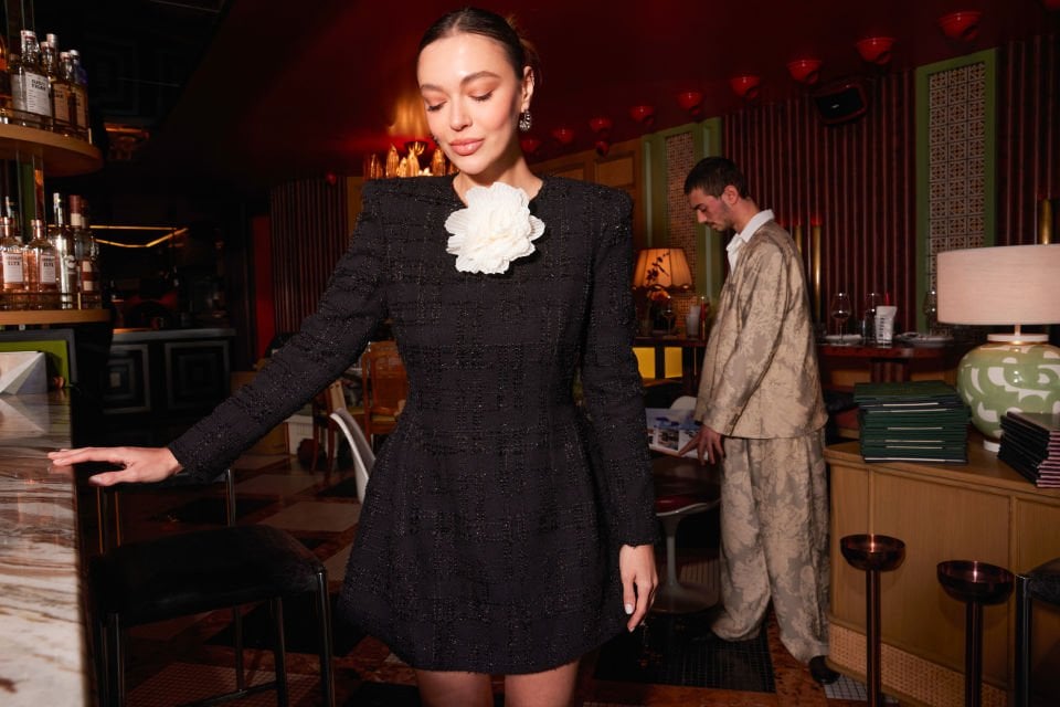 Black dress with white rose detail